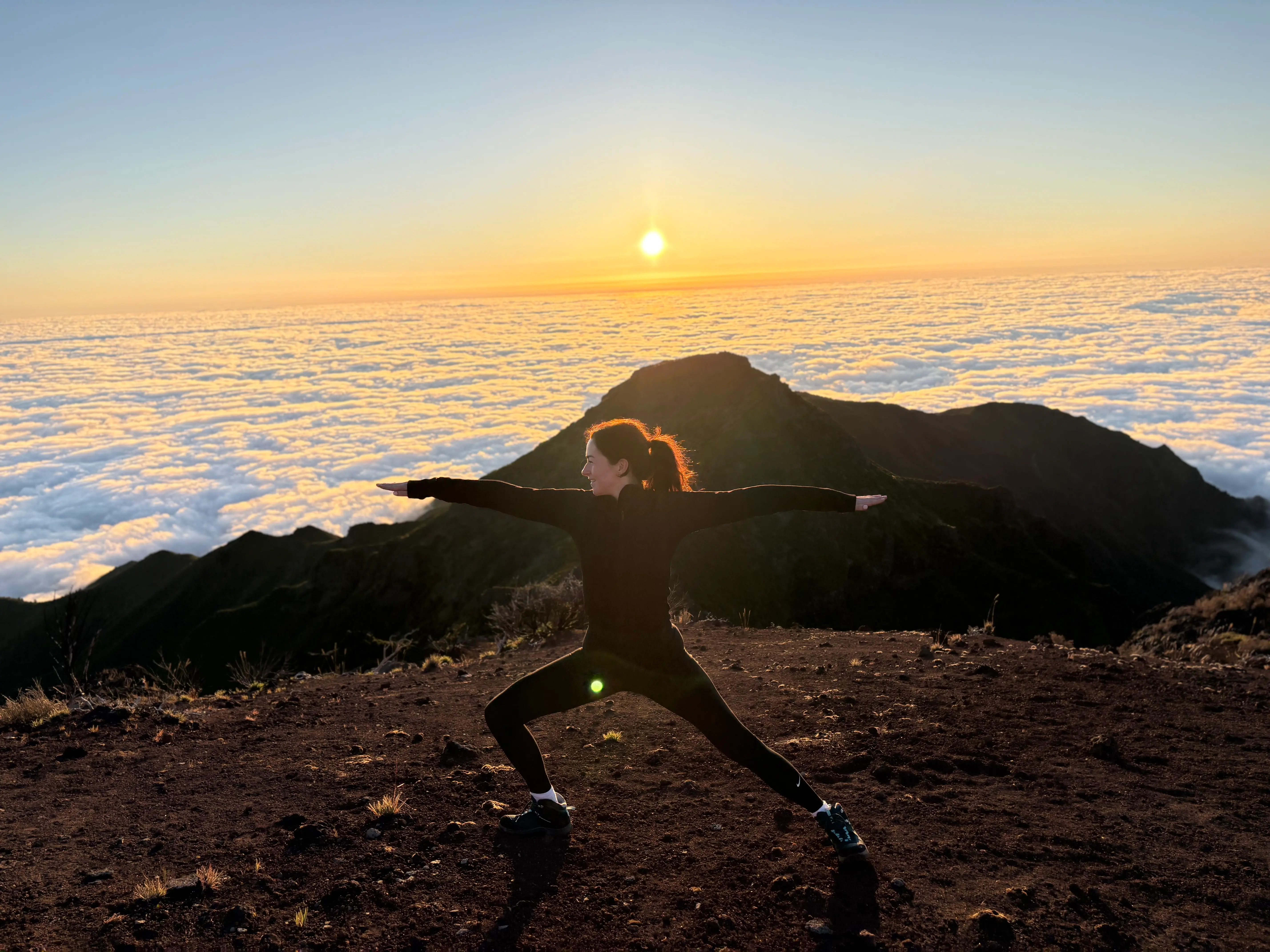 Mary Duffy practising yoga outdoors at sunrise